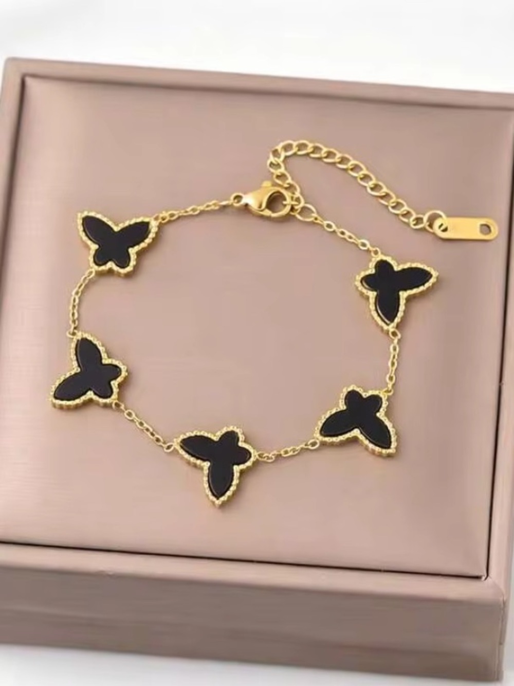 Stainless Steel Gold Butterfly Motif Bracelet with Black Enamel Accents